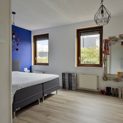 Een ruime master bedroom